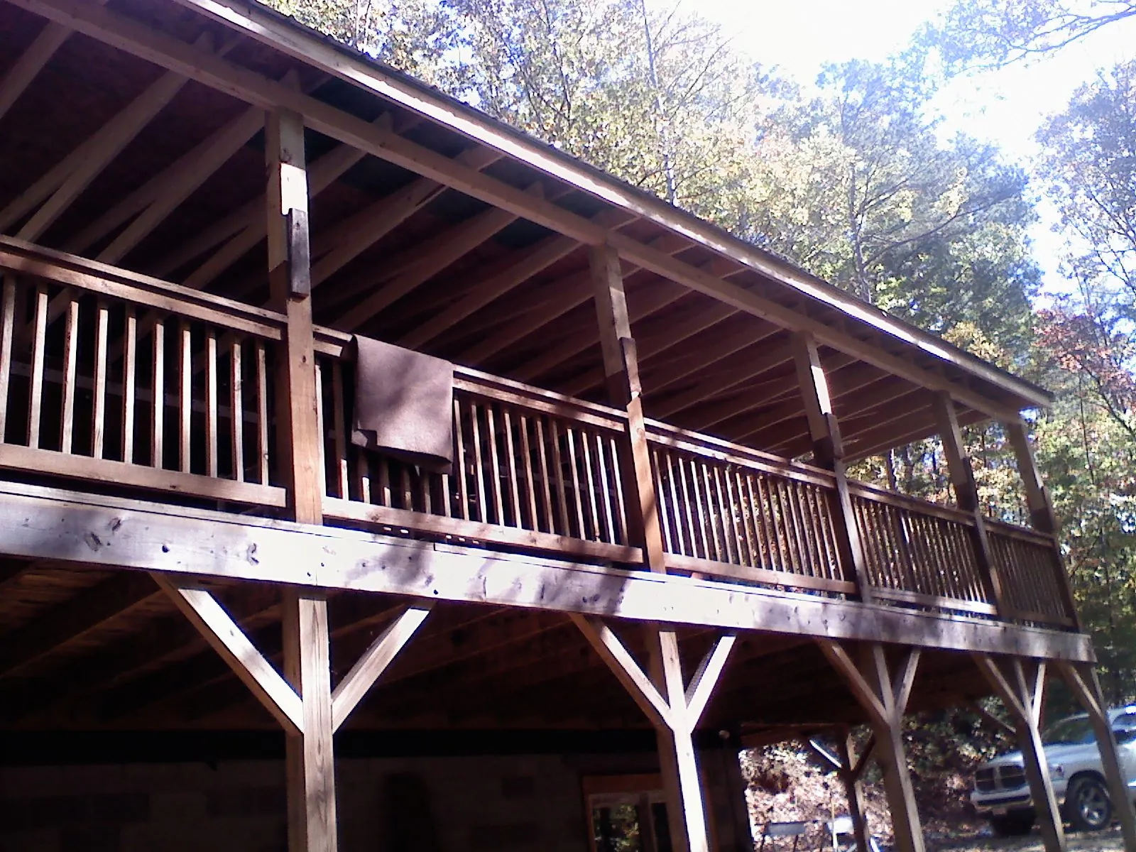 Timber framing under a new elevated porch and deck — Roof Leak Repair in Cathedral City by Roofing Brothers